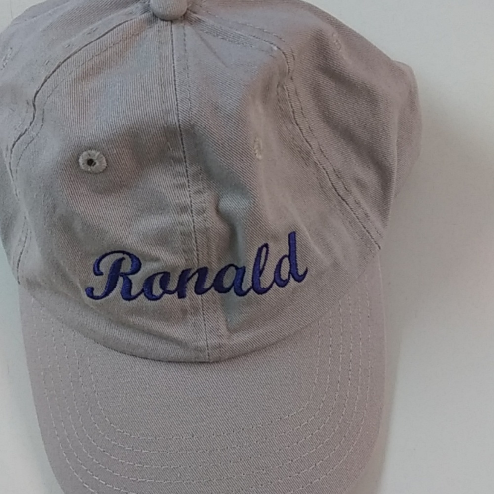 "Ronald " monogramed hat size one sz $28 .